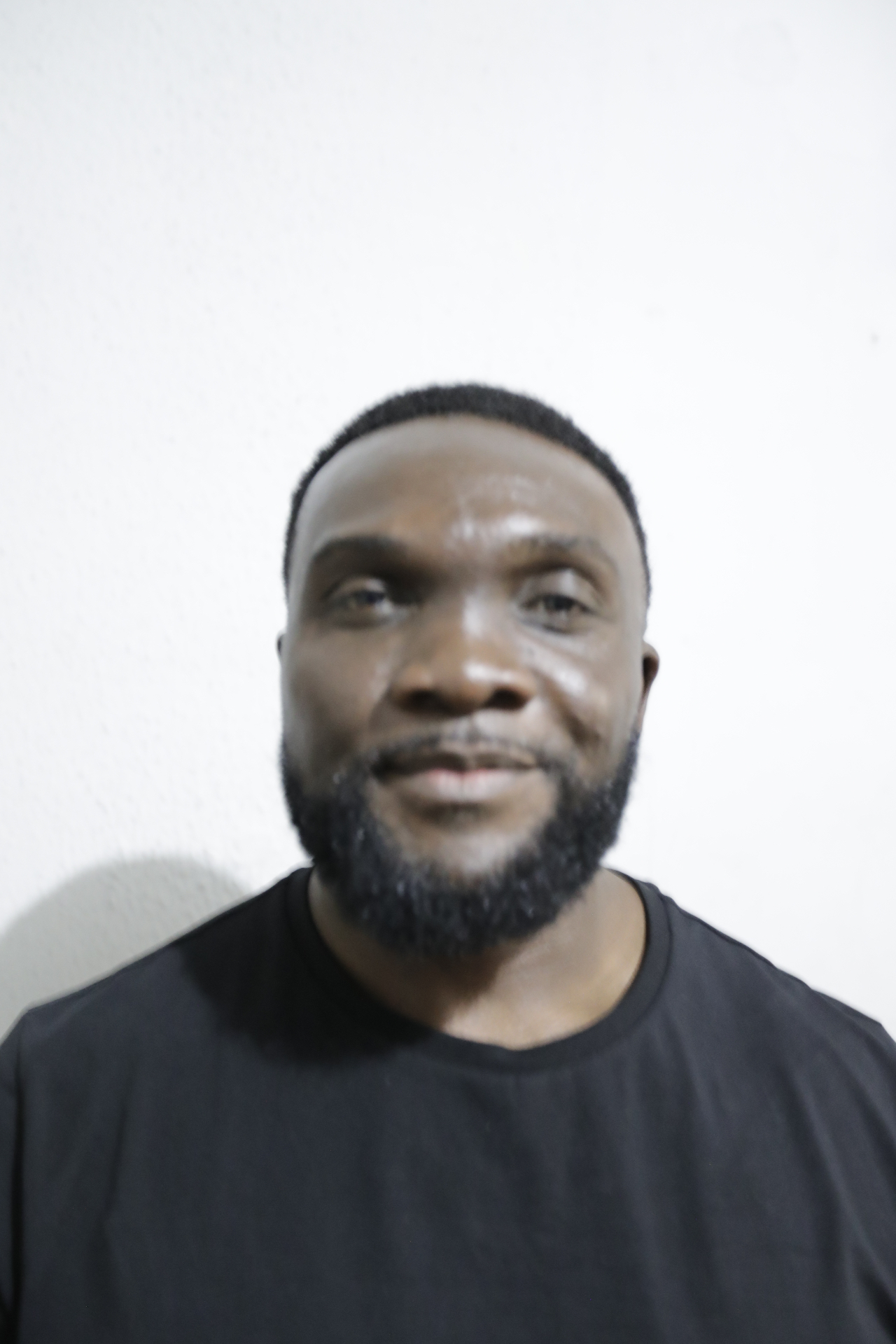 Portrait of R. Kuetche, Projects Director of PMSA